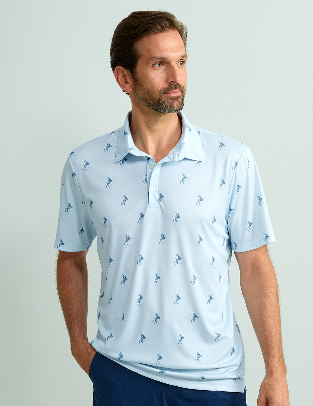 HUK Gear Men's KC Print Pursuit Performance Polo Shirts in Marlin Lure Ice Water