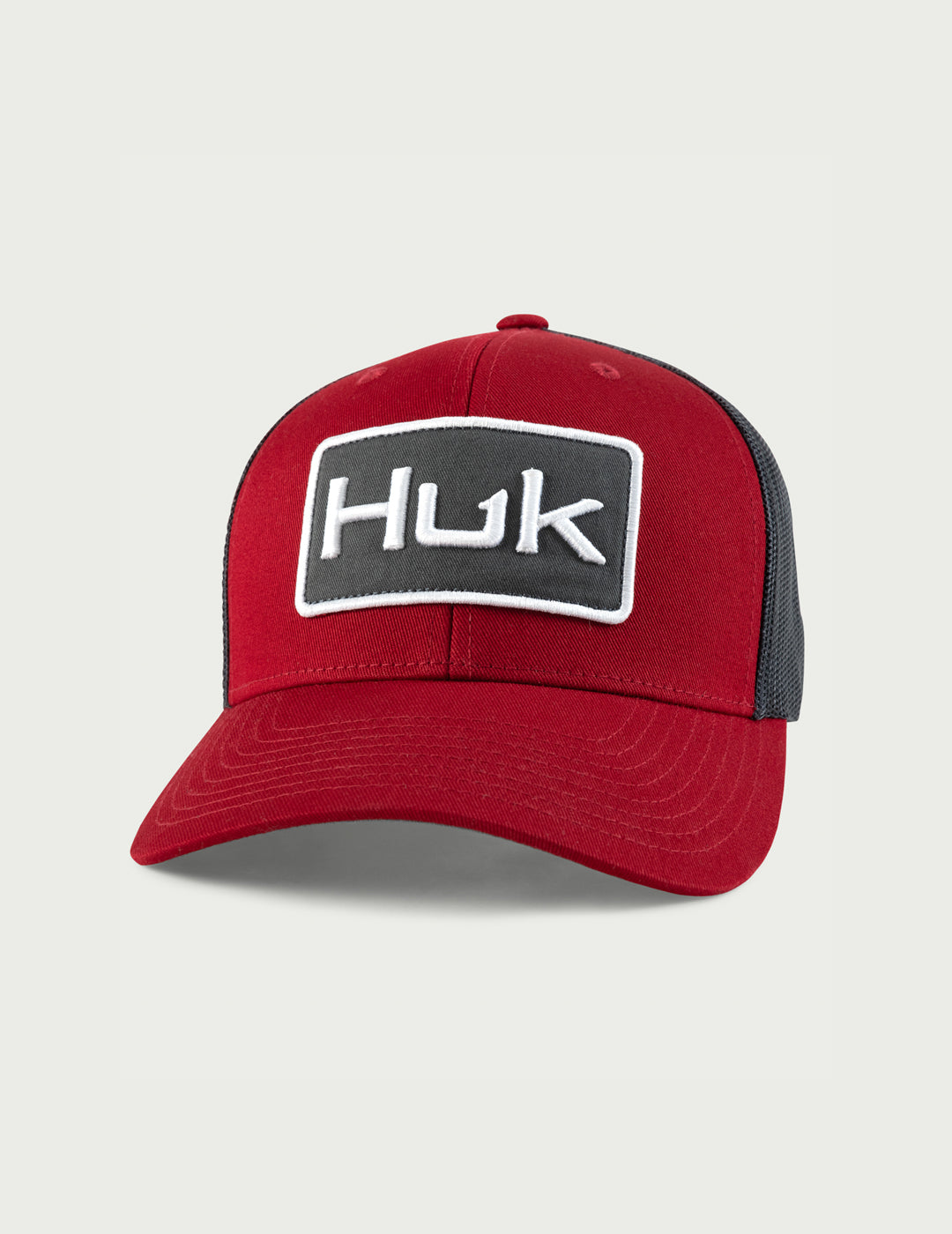 HUK Gear Men's Classic Logo Trucker Hat in Scarlet Blaze